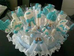 The mommy gets all the attention at a baby shower. Baby Shower Chocolate Lollipop Display Etsy Baby Shower Chocolate Tiffany Baby Showers Baby Shower