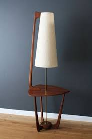 The white fabric shade has soft flecks of natural colors, revealing a unique and beautiful texture when lit. 35 Awesome Mid Century Lamps Mid Century Modern Lamps Mid Century Modern Design Mid Century Lamp