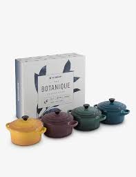 Pretty little stoneware ovens—perfectly sized for single servings—are made from enameled stoneware for even temperature distribution. Le Creuset Botanique Stoneware Mini Casserole Dish Set Of Four Selfridges Com