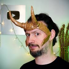 Recreated lady costume with gold and hood