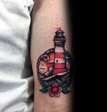Dark ink nautical compass and lighthouse tattoo. 40 Traditional Lighthouse Tattoo Designs For Men Old School