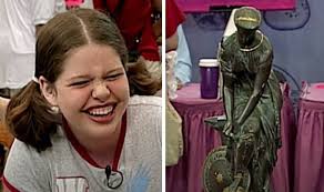 Antiques Roadshow youngster giggles as 'doorstop' present is given top  price tag