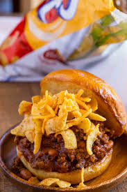 Frito Pie Sloppy Joes Made With Enchilada Sauce Ranch Beans And Shredded Cheddar On A Brioche Bun Ready In Under 30 Minu Frito Pie Sloppy Joes Recipe Recipes