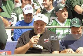 Hbo S Series The Soprano S Star James Gandolfini In The Stands Trying To Enjoy A Hotdog While Photographers Snap His Photo Before The S Sopranos Hbo Series Hbo