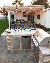 Outddoor chill zone area with hammocks, swinging canopy seat, bhuudha and water feature. Incredible Backyard Bbq Area Design Ideas Diy Outdoor Kitchen Modern Outdoor Kitchen Backyard Kitchen