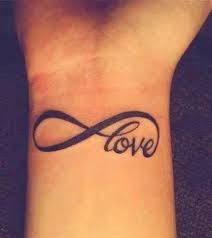 Infinity Love Tattoo For Infinite Love Towards All Things On Earth And Above Love Wrist Tattoo Girly Tattoos Infinity Love Tattoo