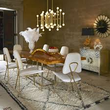 Lighten up a hulking mahogany desk by coupling it with an angular office chair. 25 Modern Dining Chairs That Will Bring Style To Your Table