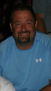 Can someone edit this photo of my late father to brighten it, remove  background people, and add a tux?