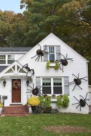 If your balcony has a roof, an adorable decorative idea is to hang floating witch hats. These Giant Diy Spiders Are Our New Favorite Halloween Decor Outdoor Halloween Halloween Decorations To Make Easy Halloween Decorations