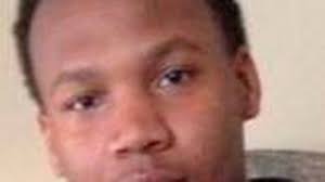 Suspect in slaying of Lexington high school football player turns himself  in