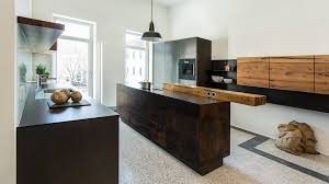 All kitchen kompact cabinets feature plywood drawers as a standard. Steel Meets Wood Warmly Accentuated Cubist Clarity Bora