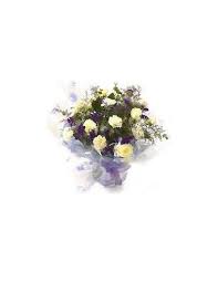 A long stem wedding bouquet is a chic arrangement with extra drama. Tom Thumb