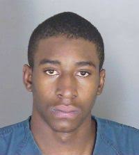 Man arrested in motel murder, another suspect