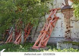 Construction Wooden Stops Support Brick Wall Stock Photo 1313198156 |  Shutterstock