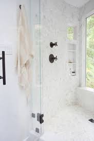 The different tile sizes provide some interesting flow and movement to the space, and the gray paint around the alcove shower (note the marble hex tile at the bottom there) highlights the veining really well. 60 Stylish Hexagon Tiles Ideas For Bathrooms Digsdigs