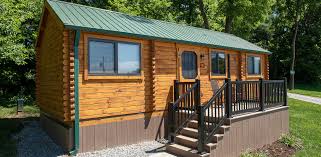 Concrete logs siding can make your home look like a log cabin, so you get a log cabin home look without the maintenance or expense. Lancaster Log Cabins Real Log Park Model Cabins