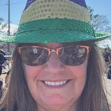 Which Dremel attachment can remove glaze from kiln shelves?