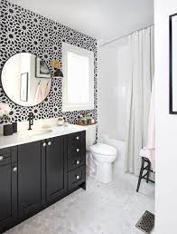 A comfortable bathroom is a key source of tranquility in your home. Loving This Chic Black And White Bathroom White Bathroom Designs Bathroom Accent Wall Bathroom Interior