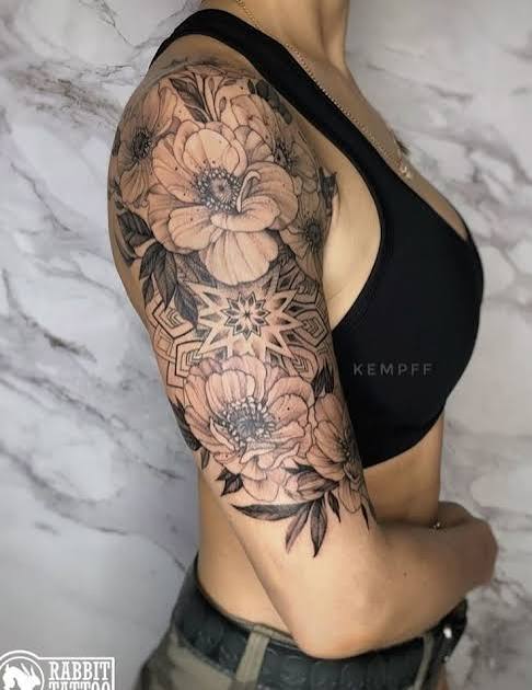 Flower and geometric tattoo