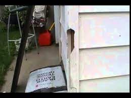 You will need to have an assistant help you remove the damaged vinyl. Siding Repair On The Cheap Youtube
