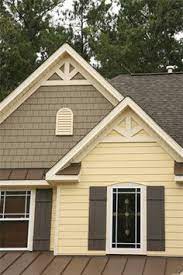 The door has an oversized 16 panel window to let the light in and allow people to see who's at the door. 12 Best Cream Colored Houses Ideas House Colors House Exterior Yellow House Exterior