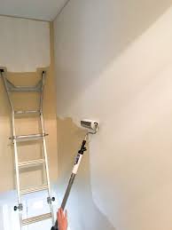 How To Paint High Walls On Stairs Stairwell Decorating Decorating Stairway Walls Painted Staircases