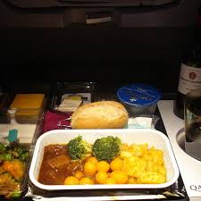 Beef In Red Sauce With Baked Potatoes Qatar Airways In Flight Meal Airplane Food Airline Food