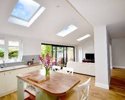 This velux roof window floods this single storey extension with daylight, which bounces off the sleek metal appliances and bright walls. Image Result For Velux Window Extension Velux Windows Kitchen Diner Lounge Velux Windows Kitchen
