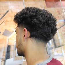 Even with curly hair, you can sport your favorite taper fade haircut provided an efficient hairdresser guides you. Taper Haircuts With Curly Hair Novocom Top