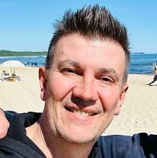 Does anyone know if Nikon has plans to release a radio controller for the  Nikon Z 5 ii so the SB-5000 speedlight can be triggered by radio rather  than by optical triggering?