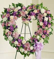 White roses are perhaps one of the most popular choices of flower for a funeral, especially at the funeral of a child or a young adult. Purple And White Funeral Heart A Bella Mia Flowers Boston