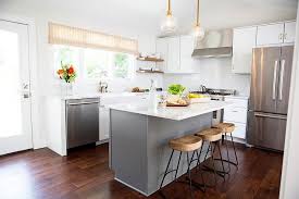 High quality kitchen and bathroom cabinetry. White And Gray L Shaped Kitchen Transitional Kitchen