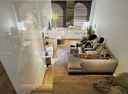 This layout is another one that works best with a full bed, but is ideal for anyone who needs extra storage space, especially if you're burdened with small closets. Tiny Nyc Apartment Small Apartment Interior Small Apartment Design Small Apartment Living Room