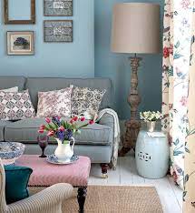 Open space living room interior with poster on grey wall with wainscoting, window with drapes and pink real photo of grey settee with dirty pink pillow standing in white living room interior with fresh plant navy blue armchair next to lamp in sophisticated apartment interior with painting and flowers. Pin On New Home Ideas