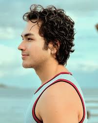 Beach daze. Hair waves.