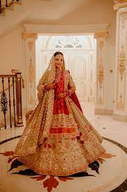 A Royal Destination Wedding With The Bride In A Stunning Red White Lehenga Bridal Lehenga Red Golden Bridal Lehenga Indian Bridal Outfits