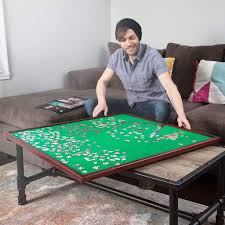 Design company unnecessary inventions have created a unique jigsaw puzzle coffee table which they have launched via kickstarter this month with early bird pledges available from $139. Buy Mary Maxim Square Jigsaw Puzzle Table Spinner Puzzle Tables For Adults Puzzle Board For Storage Felt Mat 34 X 34 Puzzle Holder Keeper Up To 1500