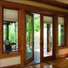 Rotating the handle will result in pella script being upside down. Pella French Doors With Motorized Between The Glass Blinds And Shades That Raise And Lower With The To Hinged Patio Doors French Doors Patio Wooden Patio Doors