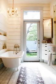 Curtains, slipcovers, lamps, fans, valances, fireplaces, mirrors Fancy Bath Lighting Inspiration And Tips For Hanging A Chandelier Over The Bathtub Apartment Therapy