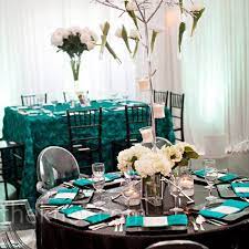 Planning a wedding is a truly magical experience. Tulips Set Inside Glass Tubes Hanging From The Branches Of A Silver Tree Added Height To The D Silver Wedding Colours Teal And Grey Wedding Black Color Palette