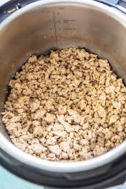 Serve ground turkey mixture with a slotted spoon, dividing among. Instant Pot Turkey Chili Garnished Plate