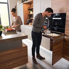 Shopstyle.com has been visited by 100k+ users in the past month The Centrepiece Of The Team 7 K7 Kitchen Is The Infinitely Height Adjustable Kitchen Island New Kitchen Designs Interior Design Kitchen Modern Kitchen Design