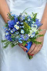 Just look at this beautiful combination…. Stunning Blue Wildflower Bridesmaid Bouquet With Cornflowers Flower Bouquet Wedding Wildflower Wedding Bouquet Wedding Flower Guide