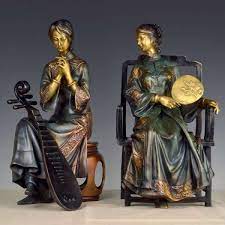 Early 20th century, cast bronze with embossing. A Set Of Four Stylized Modern Bronze Statues Of Me A Bronze Statue Of A Chinese Woman