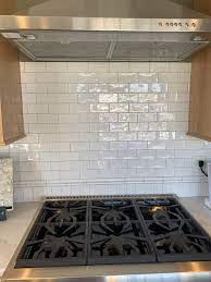 Need tile for your shower? Glossy Subway Tile Backsplash White Subway Tile Backsplash Kitchen Cabinet Colors Farm Kitchen