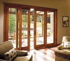 Sliding doors with grilles like we'll have. Sliding Doors In Living Room But With Another Set Of Sliding Doors So The Whole Wall Opens Up Saw At A South French Doors Patio Sliding Patio Doors Patio Doors