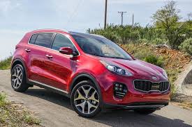 loaded with tech and room to sprawl kia s sportage is compact in name only kia sportage kia motors kia