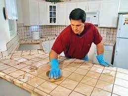 Place the tiles on the countertop in the desired pattern, working on the border first and then filling in the middle. Install Tile Over Laminate Countertop And Backsplash How Tos Diy