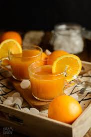 Winterlicher Orangenpunsch Mit Rum Und Kandis Von Diamant Zucker Ina Isst Orangenpunsch Punsch Gesundes Eis Am Stiel