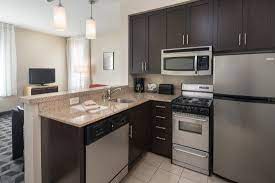 The main guest room features two queen beds, a wet bar area, a private bathroom, and a ocean view patio or balcony. 2 Bedroom Suite Picture Of Towneplace Suites By Marriott San Diego Vista Tripadvisor
